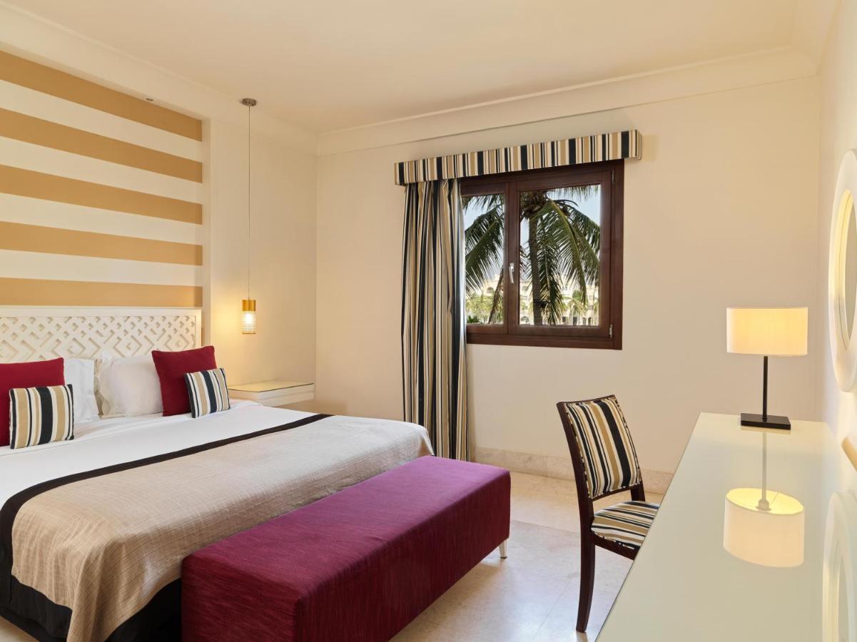 Fanar Hotel & Residences Salalah Exterior photo A bedroom at the hotel