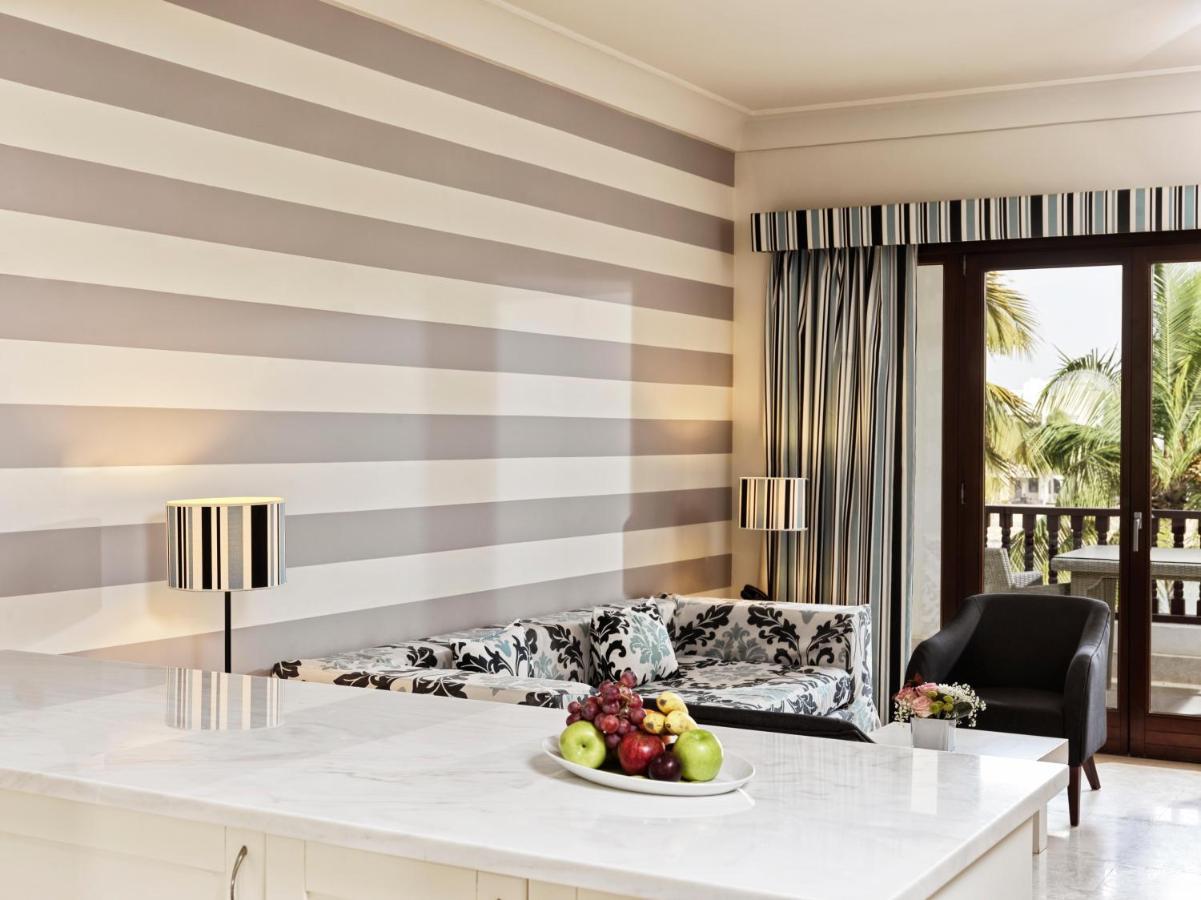 Fanar Hotel & Residences Salalah Exterior photo A room at the hotel