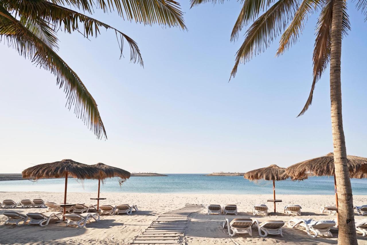 Fanar Hotel & Residences Salalah Exterior photo Beach at the resort